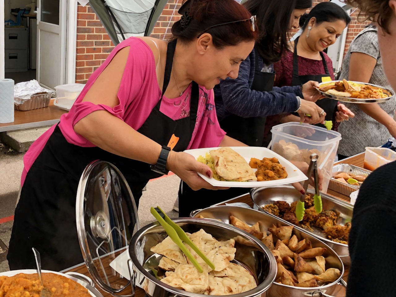 Volunteer serving food