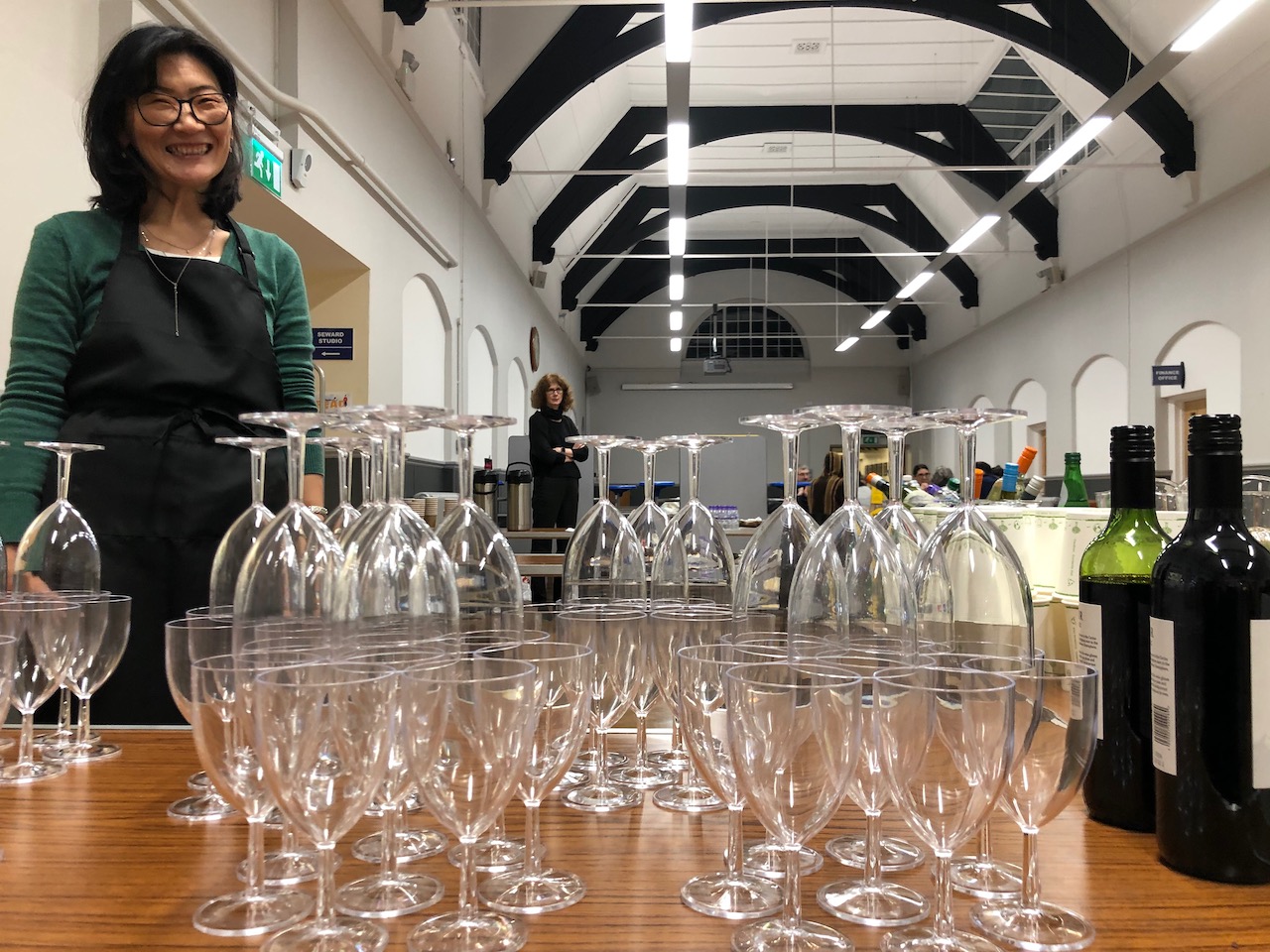 Volunteer setting up a bar