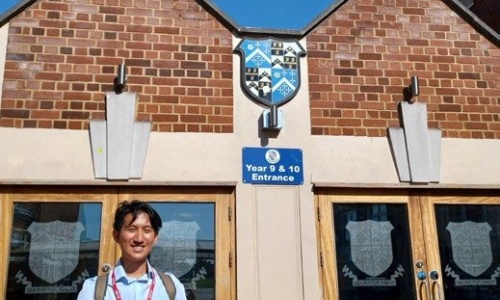 Izzudin in front of the West Entrance