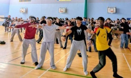 Sixth Form students leading the dance session in the Sports Hall