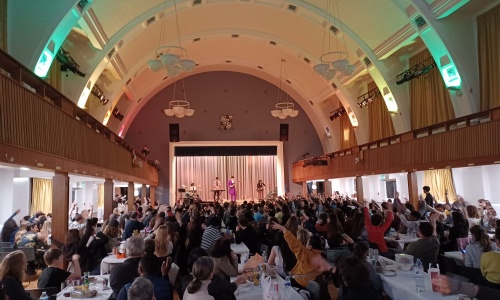 Band playing Purple Rain with the audience waving their arms